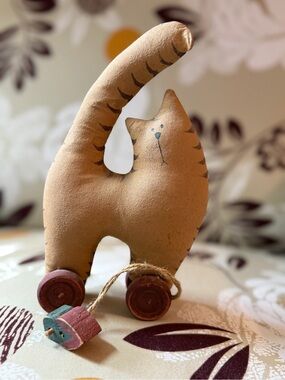 Vintage Handcrafted Tan Cat Pull Toy on Wooden Wheels